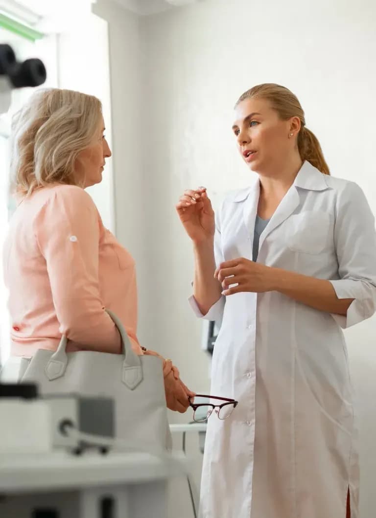 Aesthetic nurse practitioner discussing treatment options with patient during consultation